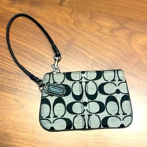 Vintage Coach black cloth wristlet.